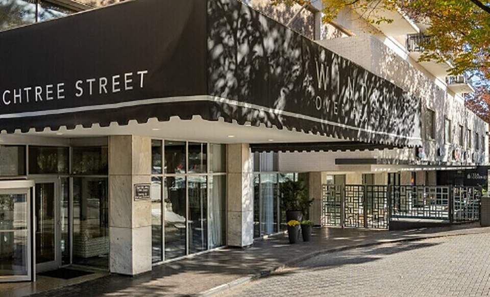 Entrance to the Windsor Over Peachtree building under the 620 Peachtree Street awning in Midtown Atlanta