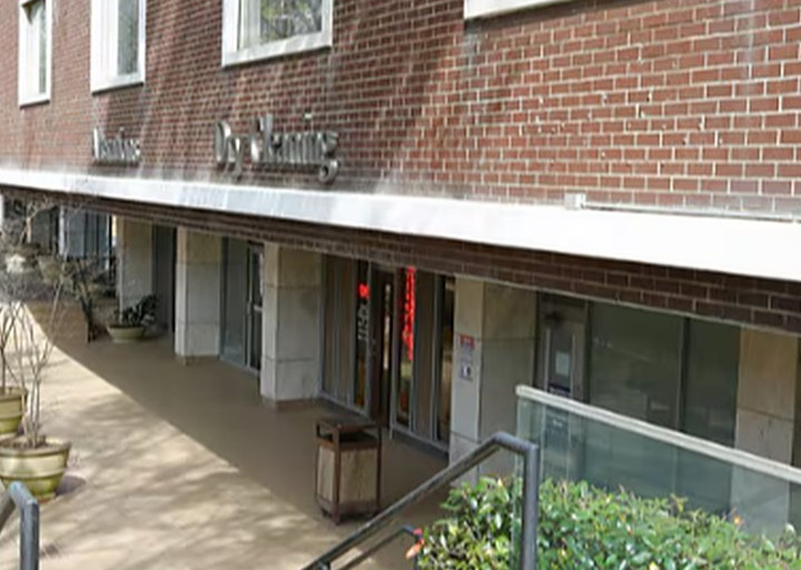 Brick storefront walkway along the ground floor of 620 Peachtree St NE, Atlanta